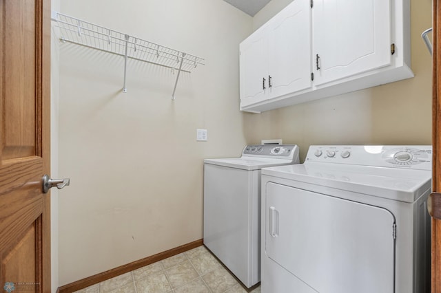 4388 52nd St S, Fargo, ND 58104 - laundry area with washing machine and dryer and cabinet space