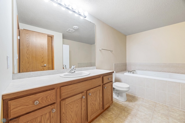 4388 52nd St S, Fargo, ND 58104 - bathroom with a garden tub, vanity, and a textured ceiling