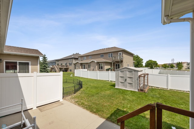 4388 52nd St S, Fargo, ND 58104 - fenced backyard featuring a shed, a residential view, and a patio