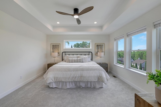 4804 12th Ave S, Minneapolis, MN 55417 - bedroom featuring multiple windows, a raised ceiling, baseboards, carpet floors, and recessed lighting