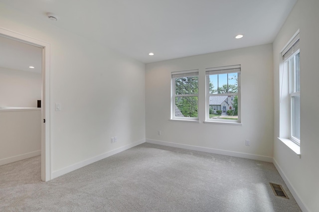 4804 12th Ave S, Minneapolis, MN 55417 - unfurnished room featuring light colored carpet, recessed lighting, baseboards, and a smoke detector