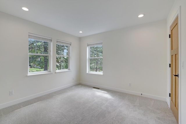 4804 12th Ave S, Minneapolis, MN 55417 - carpeted empty room featuring baseboards and recessed lighting