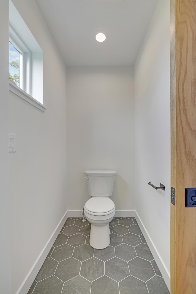 4804 12th Ave S, Minneapolis, MN 55417 - bathroom featuring toilet, baseboards, and tile patterned floors