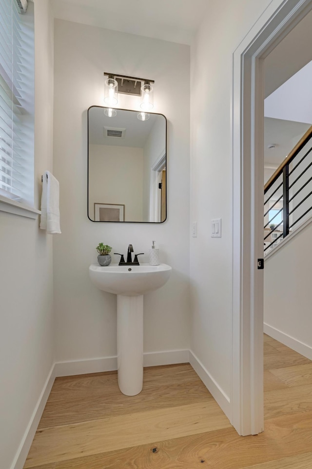 4804 12th Ave S, Minneapolis, MN 55417 - bathroom with wood finished floors and baseboards
