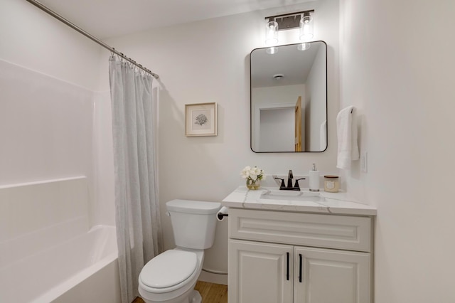 4804 12th Ave S, Minneapolis, MN 55417 - full bath featuring vanity, toilet, shower / bath combo with shower curtain, and wood finished floors
