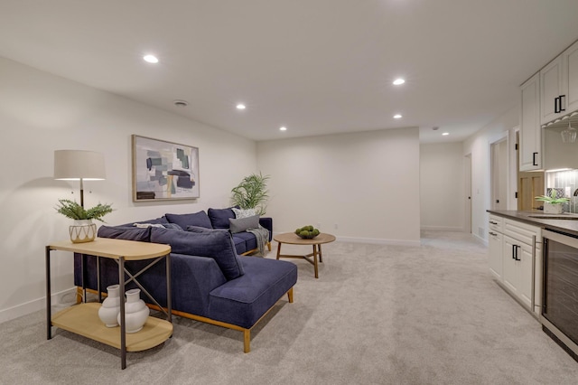 4804 12th Ave S, Minneapolis, MN 55417 - living room featuring wine cooler, recessed lighting, light colored carpet, and baseboards