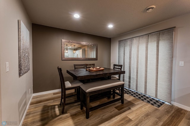 1156 42nd Ave W Unit A, West Fargo, ND 58078 - dining area featuring wood finished floors, recessed lighting, and baseboards
