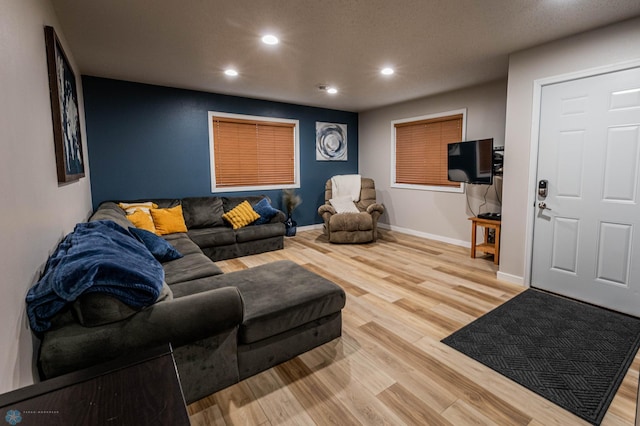 1156 42nd Ave W Unit A, West Fargo, ND 58078 - living area featuring recessed lighting, wood finished floors, and baseboards