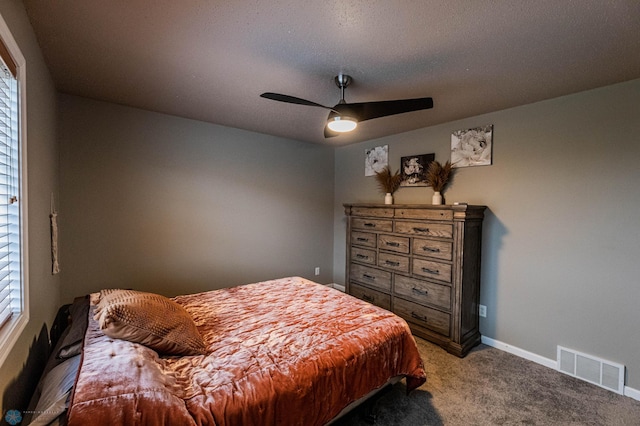 1156 42nd Ave W Unit A, West Fargo, ND 58078 - carpeted bedroom featuring multiple windows, baseboards, and a ceiling fan