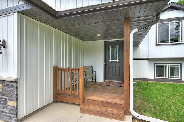 454 Roosevelt Dr, Dresser, WI 54009 - doorway to property featuring board and batten siding