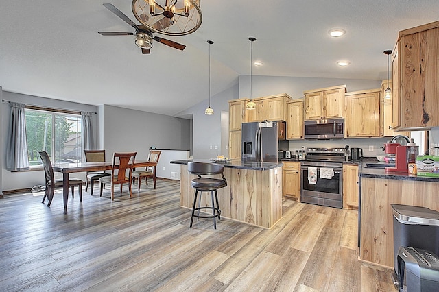 454 Roosevelt Dr, Dresser, WI 54009 - kitchen featuring appliances with stainless steel finishes, vaulted ceiling, light wood-style flooring, ceiling fan, and light brown cabinetry