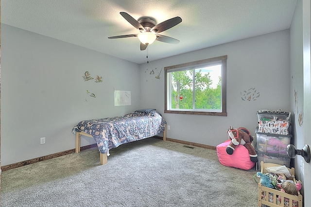 454 Roosevelt Dr, Dresser, WI 54009 - bedroom with carpet, baseboards, ceiling fan, and a textured ceiling
