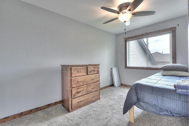 454 Roosevelt Dr, Dresser, WI 54009 - bedroom featuring light carpet, baseboards, and ceiling fan