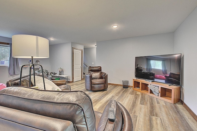 454 Roosevelt Dr, Dresser, WI 54009 - living area featuring light wood finished floors, plenty of natural light, baseboards, and recessed lighting