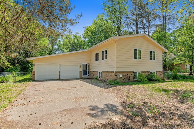 18905 Yalta St NE, East Bethel, MN 55092 - view of front of house with asphalt driveway and an attached garage