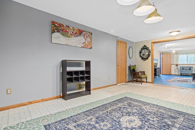 18905 Yalta St NE, East Bethel, MN 55092 - living room featuring baseboards and track lighting