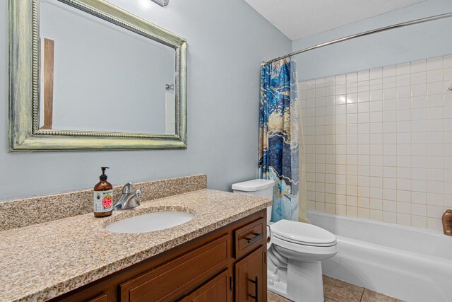 18905 Yalta St NE, East Bethel, MN 55092 - bathroom with vanity, tile patterned floors, toilet, and shower / bath combination with curtain