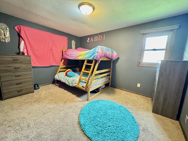 507 5th St NW, Barnesville, MN 56514 - bedroom featuring a textured ceiling and carpet floors