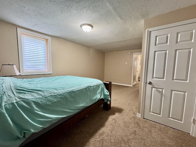 507 5th St NW, Barnesville, MN 56514 - bedroom featuring carpet flooring, a textured ceiling, and baseboards