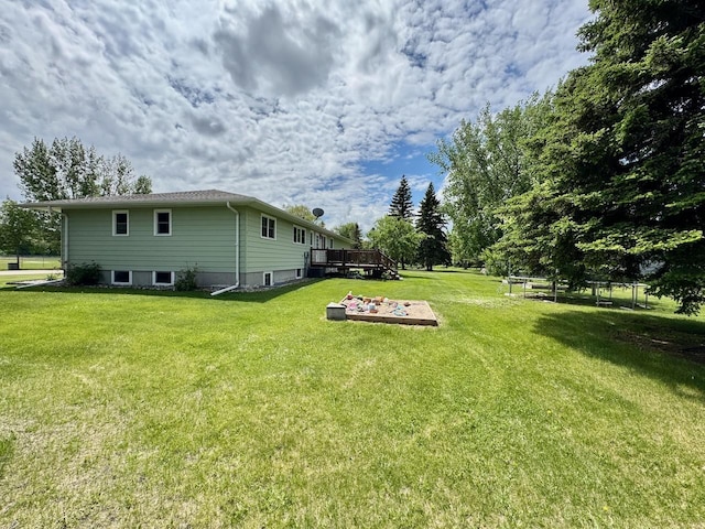 507 5th St NW, Barnesville, MN 56514 - view of green lawn featuring a wooden deck