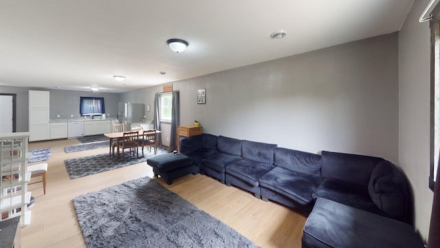 1175 Maben Ave S, Isle, MN 56342 - living area with light wood-style floors