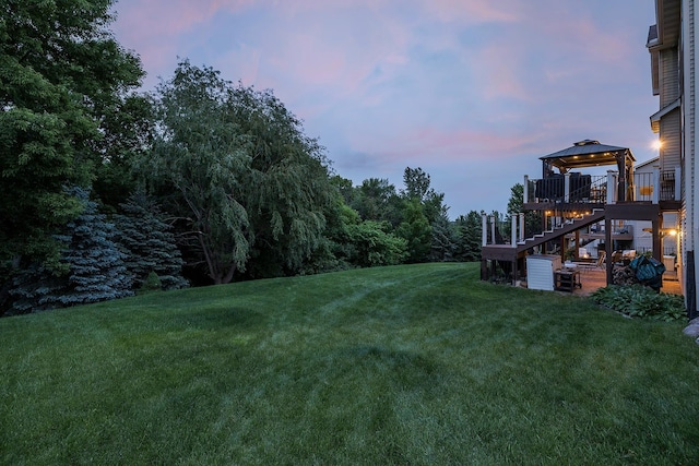2040 Fountain Ln, Waconia, MN 55387 - yard at dusk with a gazebo, a yard, and stairs