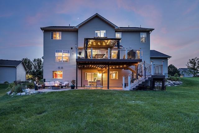 2040 Fountain Ln, Waconia, MN 55387 - back of property at dusk featuring an outdoor hangout area, a patio, a deck, a yard, and stairs