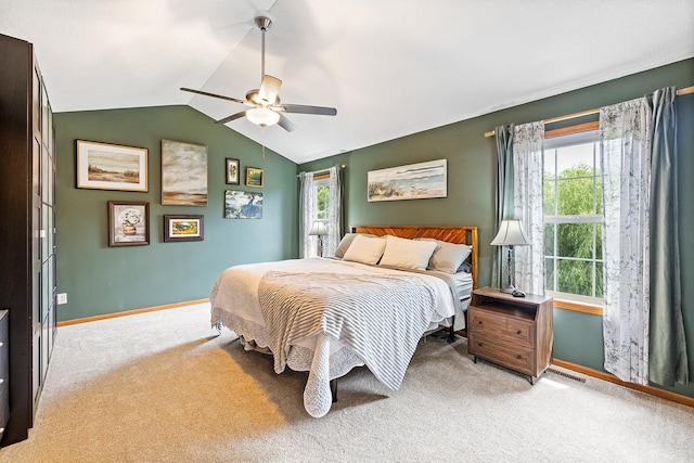 2040 Fountain Ln, Waconia, MN 55387 - bedroom with lofted ceiling, light carpet, and a ceiling fan