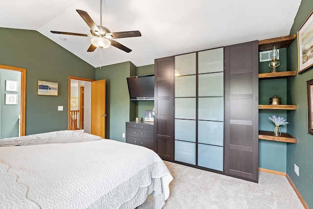 2040 Fountain Ln, Waconia, MN 55387 - bedroom with lofted ceiling, light carpet, and ceiling fan