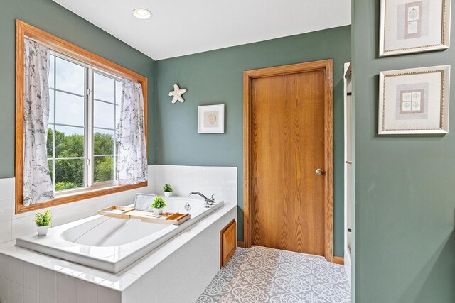 2040 Fountain Ln, Waconia, MN 55387 - bathroom featuring a garden tub and recessed lighting