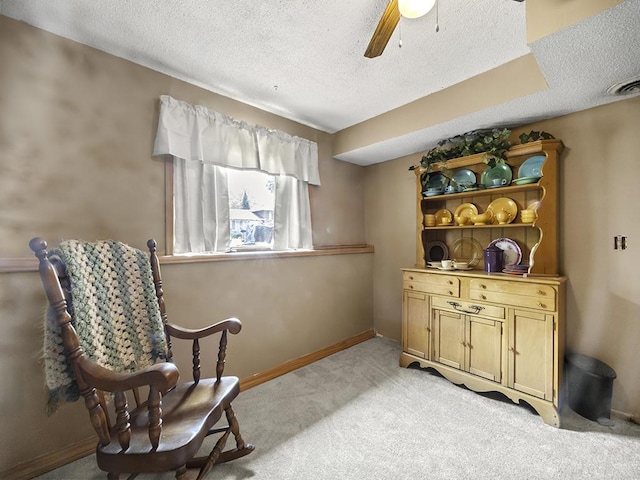 10740 99th Pl N, Maple Grove, MN 55369 - living area featuring a textured ceiling, light carpet, and ceiling fan