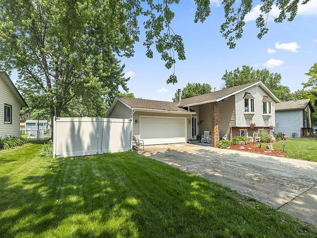 10740 99th Pl N, Maple Grove, MN 55369 - split level home featuring asphalt driveway and a garage
