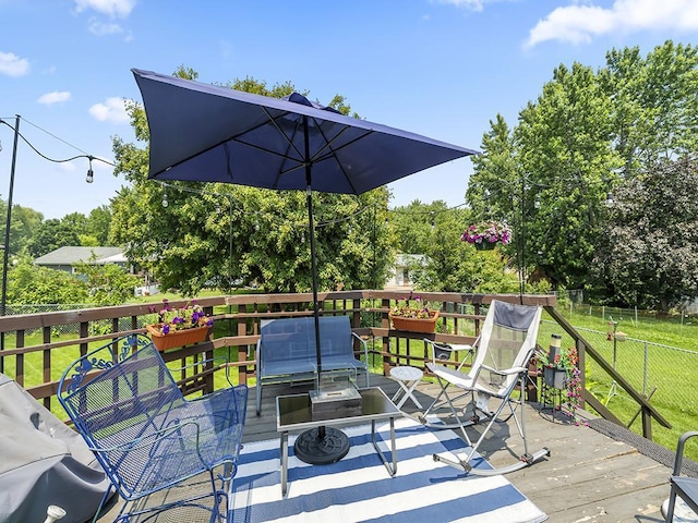 10740 99th Pl N, Maple Grove, MN 55369 - wooden terrace with an outdoor fire pit and view of scattered trees
