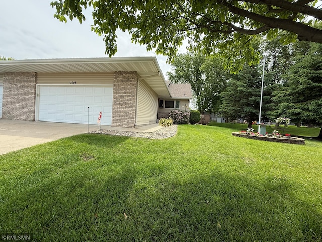1508 Terrance Cir NE, New Prague, MN 56071 - view of property exterior with brick siding, a garage, a lawn, and driveway