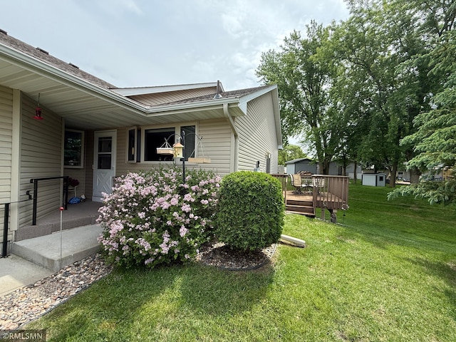 1508 Terrance Cir NE, New Prague, MN 56071 - view of property exterior with a yard and a wooden deck