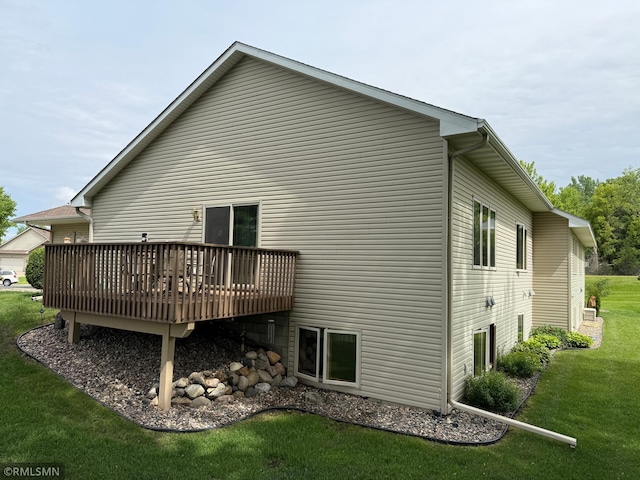 1508 Terrance Cir NE, New Prague, MN 56071 - back of property featuring a wooden deck and a lawn