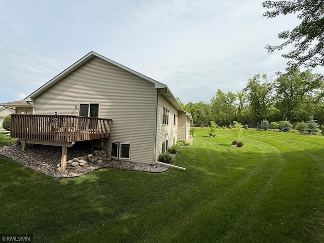 1508 Terrance Cir NE, New Prague, MN 56071 - view of side of home with a wooden deck and a lawn