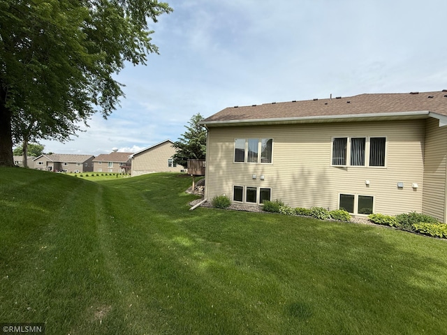 1508 Terrance Cir NE, New Prague, MN 56071 - rear view of house with a lawn