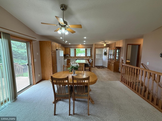 1508 Terrance Cir NE, New Prague, MN 56071 - dining room featuring a ceiling fan, light carpet, plenty of natural light, a textured ceiling, and recessed lighting