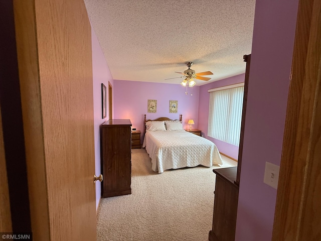 1508 Terrance Cir NE, New Prague, MN 56071 - bedroom with carpet flooring, a textured ceiling, and a ceiling fan