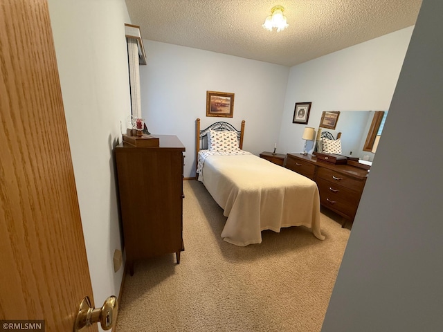 1508 Terrance Cir NE, New Prague, MN 56071 - bedroom with light colored carpet and a textured ceiling