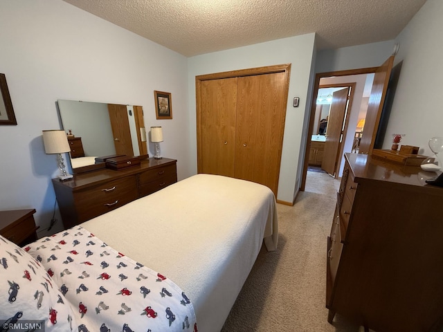 1508 Terrance Cir NE, New Prague, MN 56071 - bedroom featuring light colored carpet, a closet, and a textured ceiling