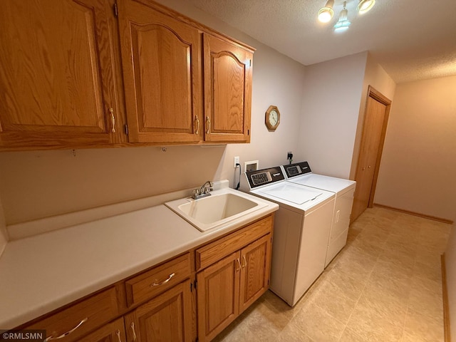 1508 Terrance Cir NE, New Prague, MN 56071 - washroom with separate washer and dryer, cabinet space, and a textured ceiling