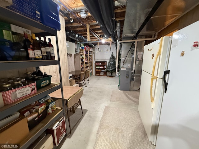 1508 Terrance Cir NE, New Prague, MN 56071 - unfinished below grade area featuring freestanding refrigerator and heating unit