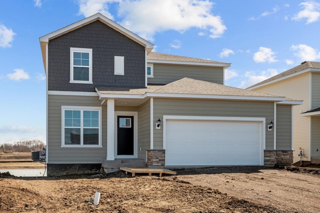 7150 Large Ave NE, Otsego, MN 55301 - view of front of property featuring cooling unit, driveway, and an attached garage