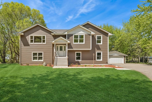 8415 Needham Ave NE, Otsego, MN 55330 - split foyer home with a front yard, a detached garage, an outbuilding, and entry steps