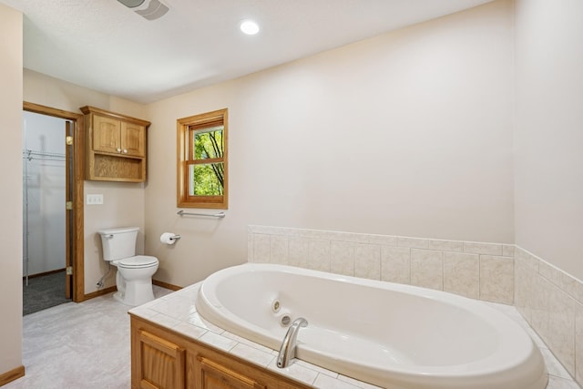 8415 Needham Ave NE, Otsego, MN 55330 - full bathroom with a jetted tub, toilet, and baseboards