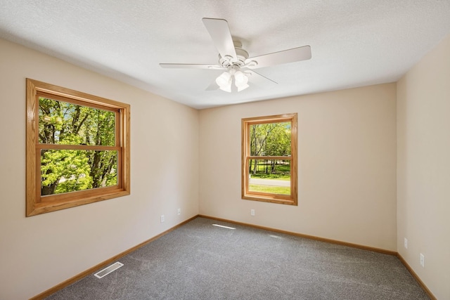 8415 Needham Ave NE, Otsego, MN 55330 - unfurnished room featuring carpet flooring, baseboards, and ceiling fan