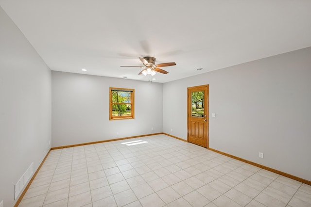 8415 Needham Ave NE, Otsego, MN 55330 - empty room with a ceiling fan, plenty of natural light, recessed lighting, and baseboards