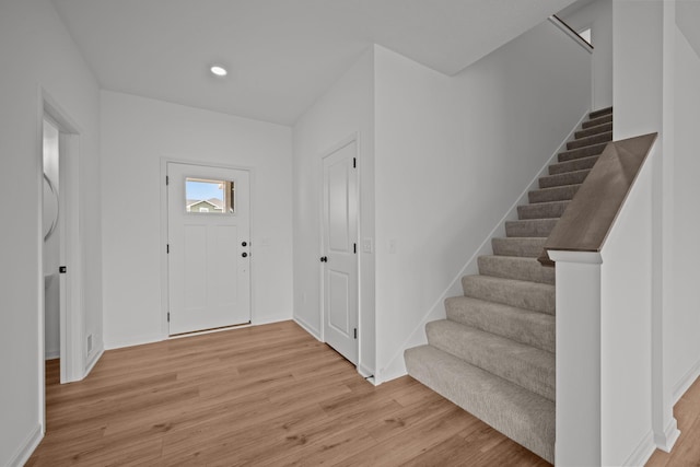 7130 Large Ave NE, Otsego, MN 55301 - foyer entrance featuring stairway, light wood-type flooring, baseboards, and recessed lighting